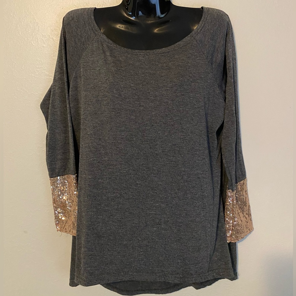 Grey long sleeve, high/low t-shirt with champagne sequin cuffs. Size small
